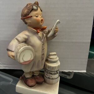 Vintage Hummel boy playing doctor